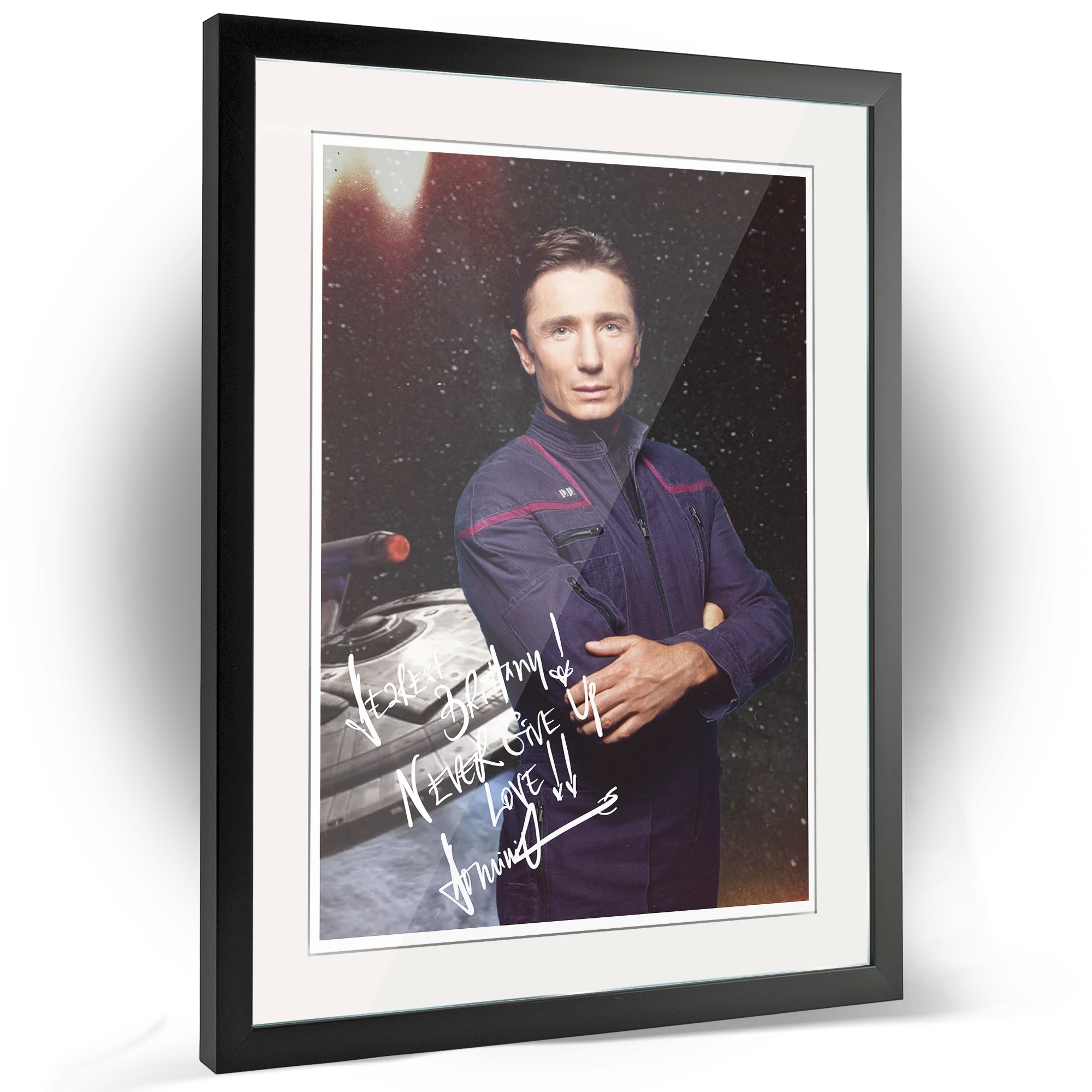 Framed poster of Dominic Keating as Malcolm Reed from Star Trek: Enterprise, a high-quality collectible offered for autographs via FanFair.