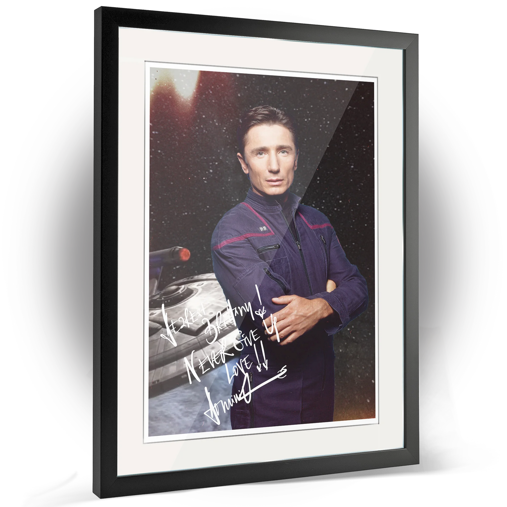 Framed poster of Dominic Keating as Malcolm Reed from Star Trek: Enterprise, a high-quality collectible offered for autographs via FanFair.